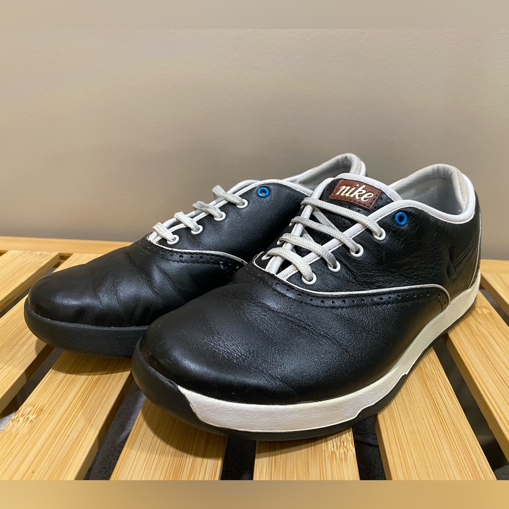 Nike Black and White Athletic Shoes with Blue Eyelets